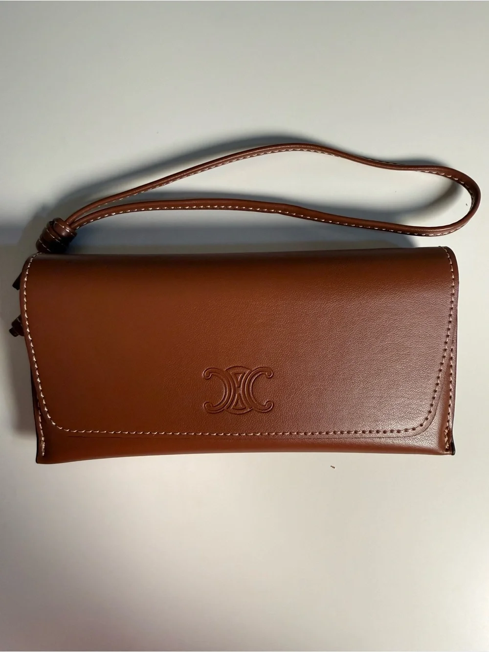 Brown Leather Wristlet Celine sunglasses case with Embossed Celine Triomphe logo